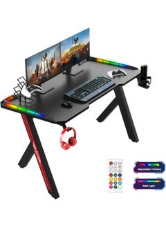 Buy Gaming Desk with LED Lights RGB Gaming Computer Table with Carbon Fibre Surface LED Home Office Desk with Remote Control Pc Workstation with Cup Holder and Headphone Hook 60 * 140cm Black in UAE