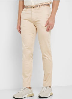 Buy Men Cream-Coloured Slim Fit Chinos Trousers in UAE