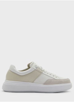 Buy Raised Logo Print Low Top Sneakers in UAE