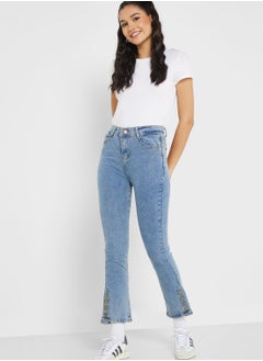 Buy Acid Wash Button Hem Detail Jeans in Saudi Arabia