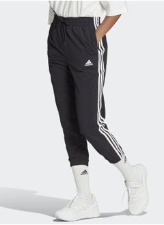 اشتري Essentials 3-Stripes Woven 7/8 Tracksuit Bottoms في الامارات