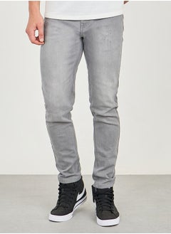 Buy Mid Rise Light Wash Ripped Skinny Jeans in Saudi Arabia