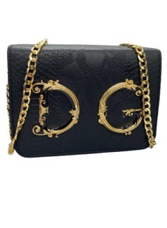 Buy Luxury women's handbag, black color with a golden metal handle, from Dolce Gabbana in Egypt