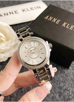 Buy ANNE KLEIN Women's Classic Cubic Zirconia Fashion Quartz Watch with Gold and Silver Splicing Stainless Steel Strap Gift 33mm in Saudi Arabia