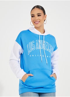 Buy Oversized Longline Color Block Slogan Hoodie in Saudi Arabia