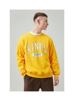 Buy Relaxed Fit Mustard King County Print Sweatshirt in UAE