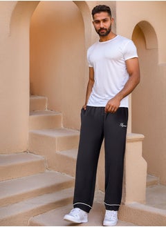 اشتري Contrast Piping Detail Relaxed Terry Joggers في السعودية