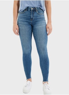 Buy High Waist Ripped Hem Jeans in Saudi Arabia