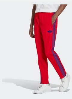 اشتري Adicolor 70s Striped Track Tracksuit Bottoms في مصر