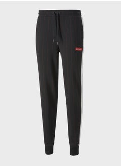 Buy COCA COLA T7 men sweatpants in UAE