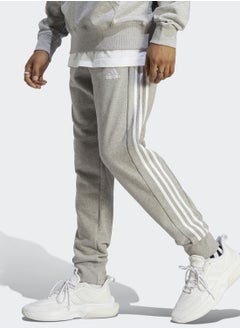 Buy 3 Stripes Essential French Terry Sweatpants in Saudi Arabia