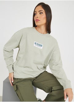 اشتري Oversized Longline Patch Slogan Sweatshirt في السعودية