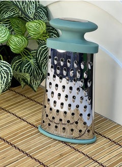 Buy Grater with plastic handle The grater has 3 different blades that are very sharp. The material is stainless steel. A strong plastic handle for easy grating and easy control. It has a rubber base for stability. Imported. Very high quality. in Egypt