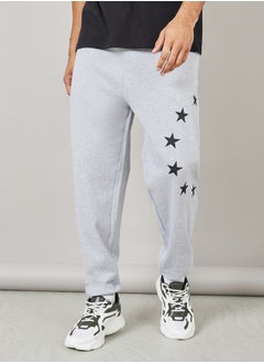 اشتري Oversized Elasticated Hem Contrast Star Print Fleece Joggers في السعودية