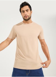 Buy Solid Regular Fit Cotton Rich T-Shirt in Saudi Arabia