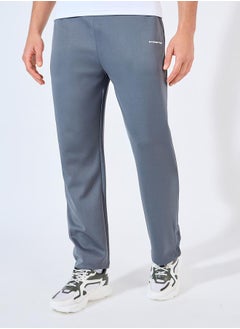 Buy Relaxed Fit Open Hem Scuba Pants With Bottom Snap Detail in Saudi Arabia