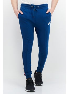 Buy Men Sportswear Fit Brand Logo Training Jogger Pant, Teal Blue in UAE