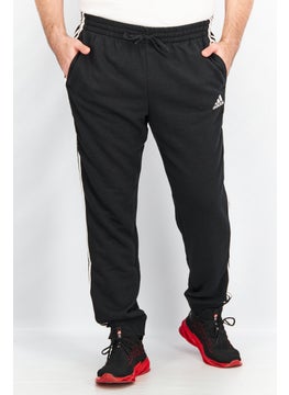 اشتري Men Sportswear Fit Essentials French Terry 3-Stripes Pants, Black/White في الامارات