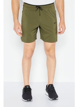 Buy Men Sportswear Fit Outdoor Short, Olive in UAE