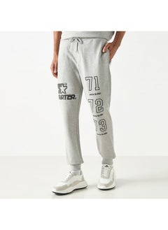 Buy Starter Logo Embossed Flexi Waist Relaxed Fit Joggers with Drawstring Closure in Saudi Arabia