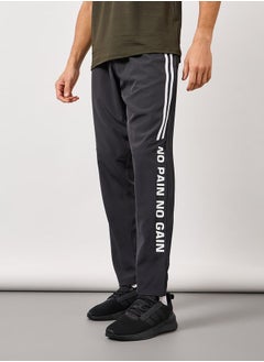 Buy Super Stretch Slogan Print Track Pants in Saudi Arabia