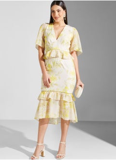 Buy Floral Back Cut Ruffle Hem Dress in Saudi Arabia