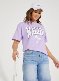 Buy Oversized Malibu Graphic Short Sleeve T-Shirt in Saudi Arabia