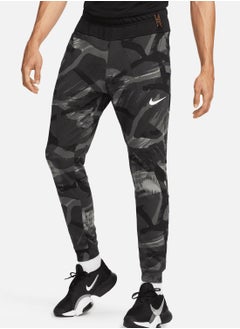 Buy Dri-Fit Fleece Taper Camo Pants in UAE