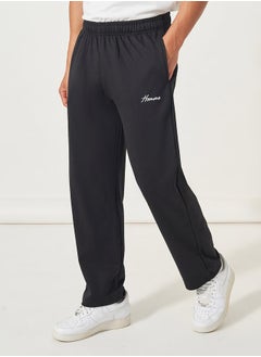 Buy Signature Relaxed Open Hem Joggers with Embroidery in Saudi Arabia