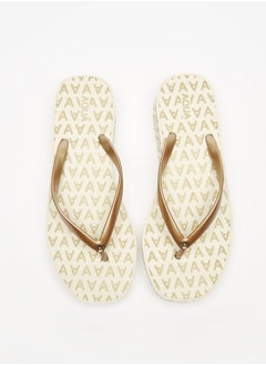 اشتري Women's Monogram Print Thong Slippers في السعودية