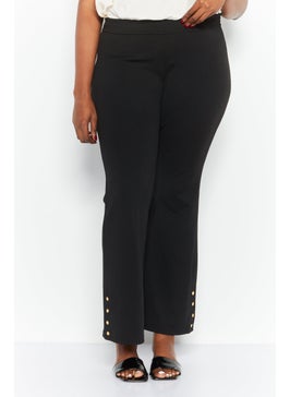 Buy Women Plus Size Solid Flare Pants, Black in UAE