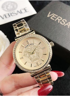 Buy Versace Women's Cubic Zirconia Classic Fashion Quartz Watch with Gold Stainless Steel Strap 36mm in UAE