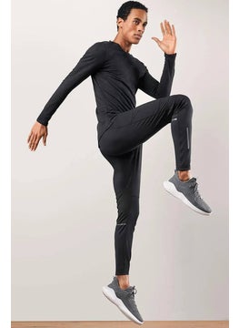 اشتري Men Sportswear Fit Solid Training Thermal Tights, Black في الامارات