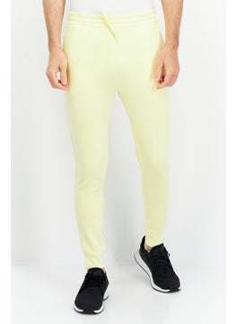 اشتري Men Regular Fit Training Sweatpants, Yellow في الامارات