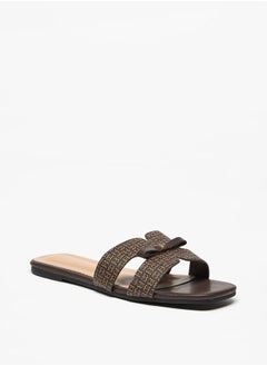 اشتري Monogram Print Slip-On Sandals with Bow Applique في السعودية