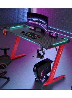 Buy Ergonomic Gaming Desk Table with RGB LED Lights with Carbon Fiber Desktop and Cup Holder & Headphone Hook Red in UAE