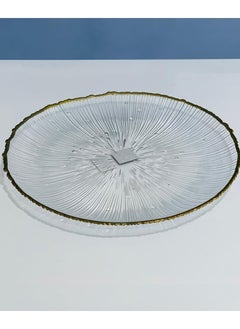 Buy A round glass serving dish with golden edges, with a unique design. 1Pc in Saudi Arabia