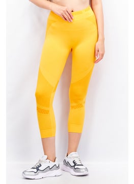 Buy Women Sportswear Fit Training 3/4 Leggings, Yellow in UAE