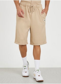 Buy Waffle Knit Oversized Shorts with Turn Up Hem & Badge Detail in Saudi Arabia