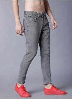 Buy Mid Rise Light Wash Tapered Jeans in Saudi Arabia