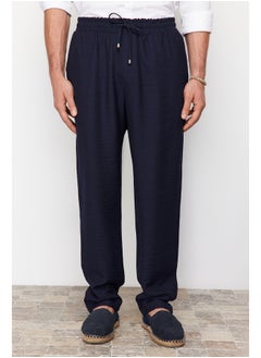 Buy Navy Blue Men's Tapered Elastic Waisted Linen Look Trousers TMNSS20PL0547 in Egypt