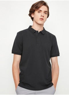 Buy Men's Solid Performance Polo - Black in Saudi Arabia