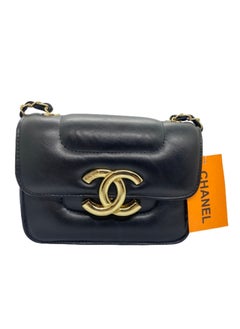 Buy A luxurious black women's handbag with a gold metal handle from Chanel in Egypt