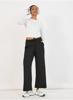 Buy Elastic Waist Slit Pocket Detail Straight Pant with Drawstring Closure in Saudi Arabia