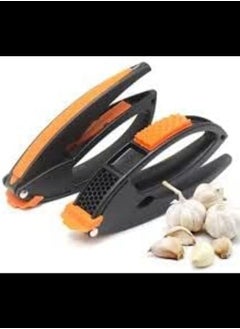 Buy Multifunctional Fruit Peeler and Garlic Press 1 pc in UAE