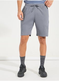 Buy Texture Knit 7" Training Shorts with Pockets in Saudi Arabia