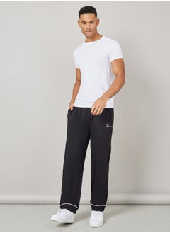 اشتري Contrast Piping Detail Relaxed Terry Joggers في السعودية