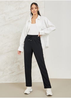 Buy Textured Tapered Fit Pants with Pockets in Saudi Arabia