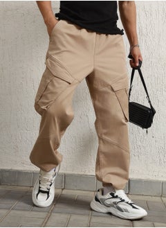 Buy Men Taupe Trousers in UAE