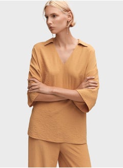 Buy V-Neck Knitted Top in Saudi Arabia